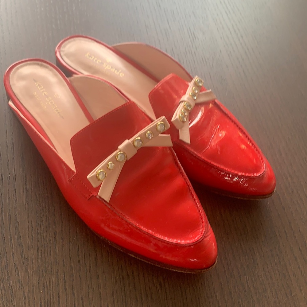 Red Kate Spade mules with pink bling bows size 7.